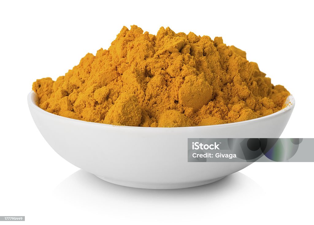Turmeric powder Cilantro in plate isolated on a white background Asia Stock Photo