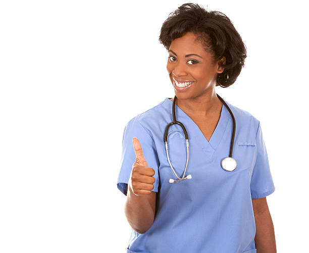 A female nurse with her surgical colleague, the focus is mainly on the doctor in blue scrubs