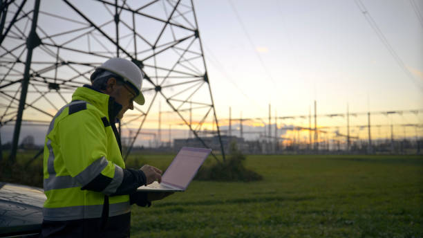 istock Side View Of Male Engineer Using Laptop While Standing At Power Station During Sunset 1777963184