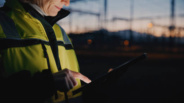 istock Midsection Of Electrical Engineer Using Digital Tablet At Dark Power Station During Twilight 1777965993