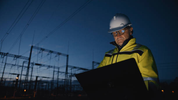 istock Mature Male Electrical Engineer Using Laptop Against Blue Sky During Twilight 1777966019