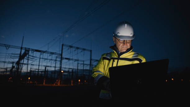 istock Determined Male Electrical Engineer Working On Laptop At Dark Power Station During Twilight 1777966553