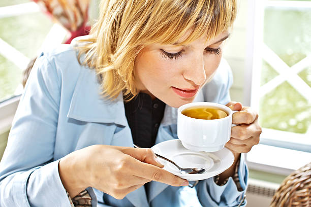 istock women drinking  coffee i or tea smiling 177797711