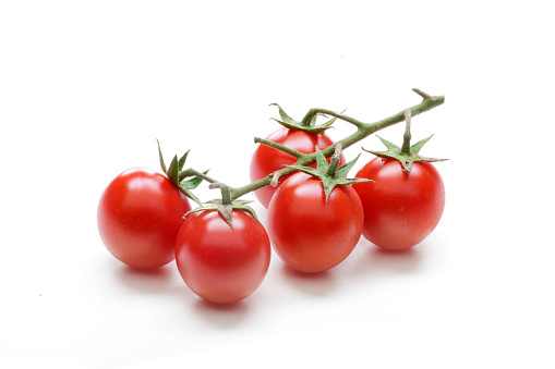vine cherry tomatoes on a white background