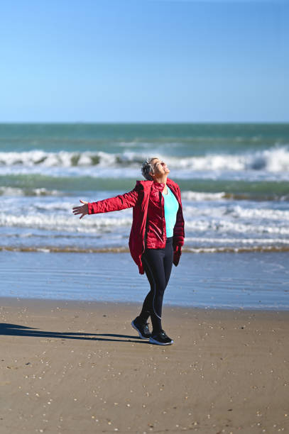 istock active senior woman traveling outdoors alone. 1777984324