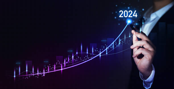 istock Businessman draw growth graph a year 2024 of business and data analysis. Development to success in year 2024. 1777984505
