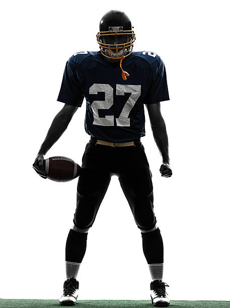 quarterback american football player man silhouette one caucasian quarterback american football player man in silhouette studio on white background american football player studio stock pictures, royalty-free photos & images