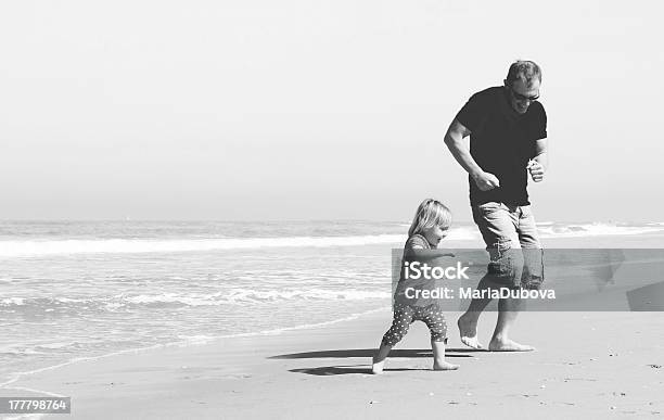 A Happy Father And Daughter On The Beach Stock Photo - Download Image Now - Father, Retro Style, Old-fashioned