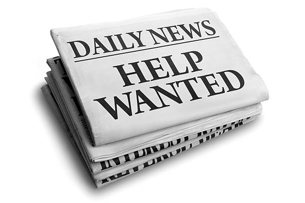 istock Help wanted daily newspaper headline 177799915