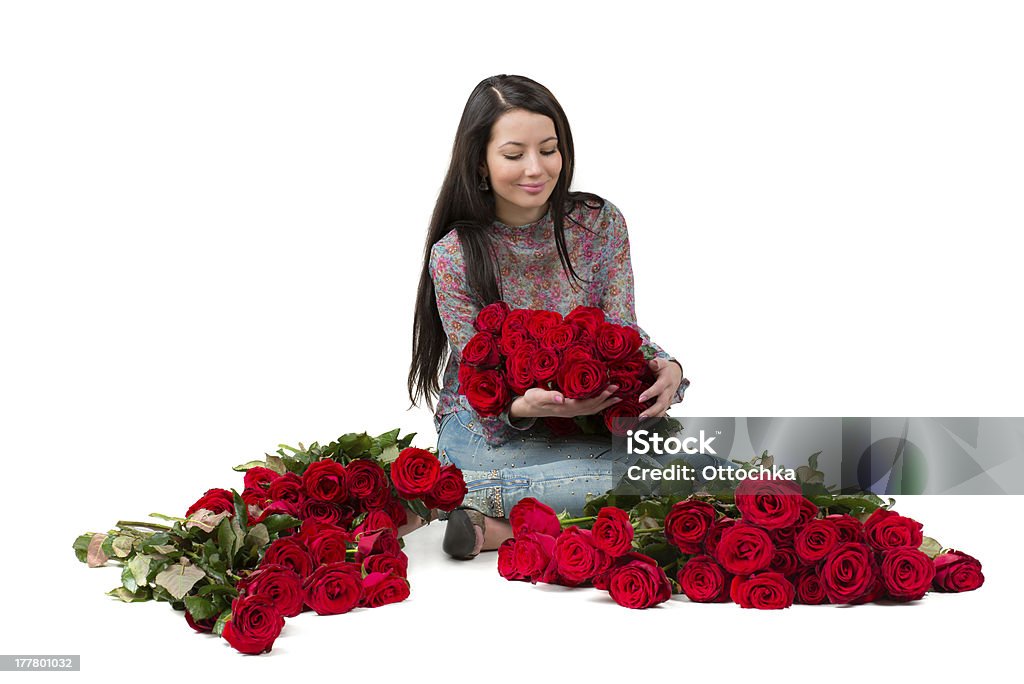 ブルネットの女性を、大きな赤いバラのブーケ - フラワーガールのロイヤリティフリーストックフォト