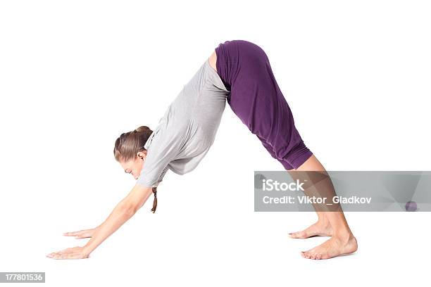 Young Woman Doing Yoga Exercise Downwardfacing Dog Stock Photo - Download Image Now