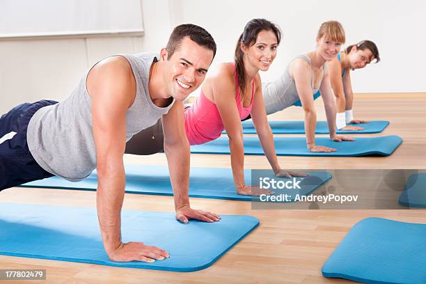 Gym Class Doing Press Ups Stock Photo - Download Image Now - Active Lifestyle, Activity, Adult