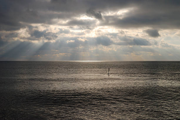 The beach and offshore platforms in Sizewell, Suffolk, England, UK