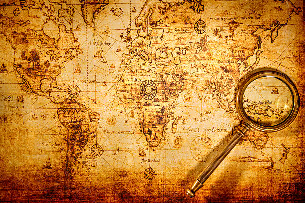 istock Vintage magnifying glass lies on an ancient world map 177803909