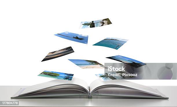 Photobook With Photos Of Beach Scenes Floating Stock Photo - Download Image Now - Photographic Print, Photography, Mid-Air
