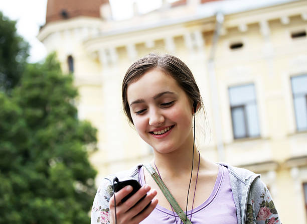 istock Girl with a mobile phone 177804849