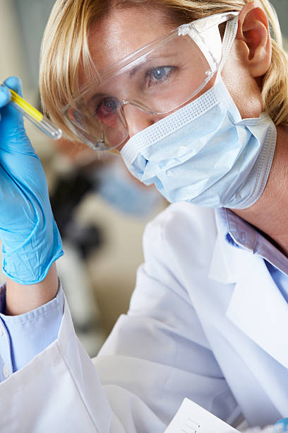 istock Female Scientist Studying Test Tube In Laboratory 177805026