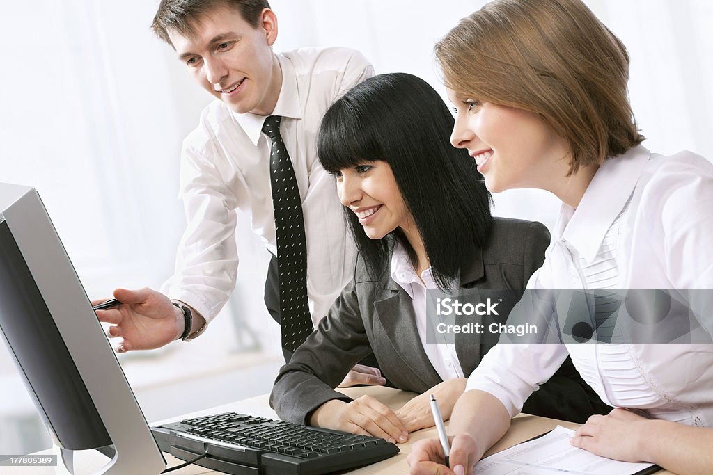 Business people Happy young business people working together Adult Stock Photo