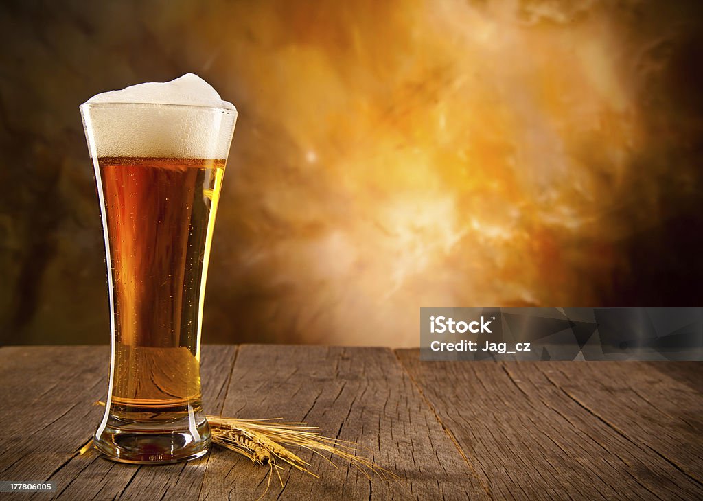 Beer Glass of beer on wooden table. Free space for text Alcohol - Drink Stock Photo