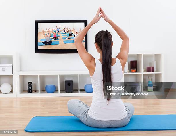 Spiritual Woman Meditating At Home Stock Photo - Download Image Now - Activity, Adult, Adults Only