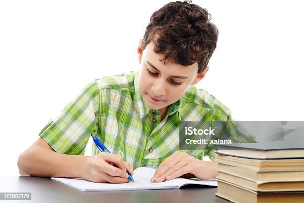 Student Doing Homework Stock Photo - Download Image Now - Alertness, Book, Boys