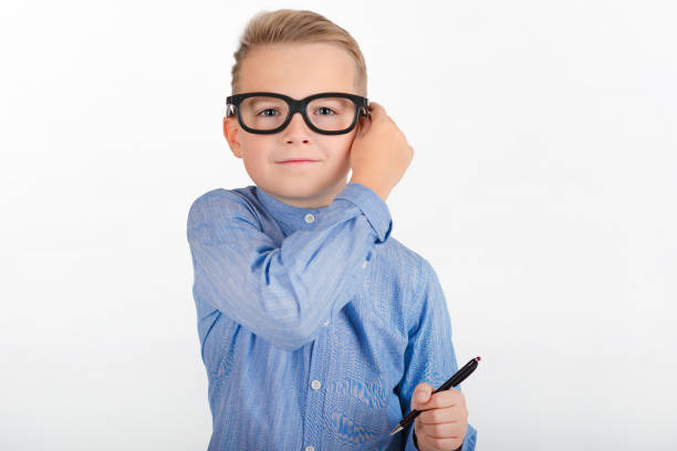 istock boy in glasses with a pen in a white isolated background 1778074488