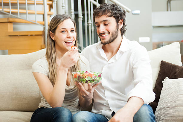 istock Woman eating a salad 177808178