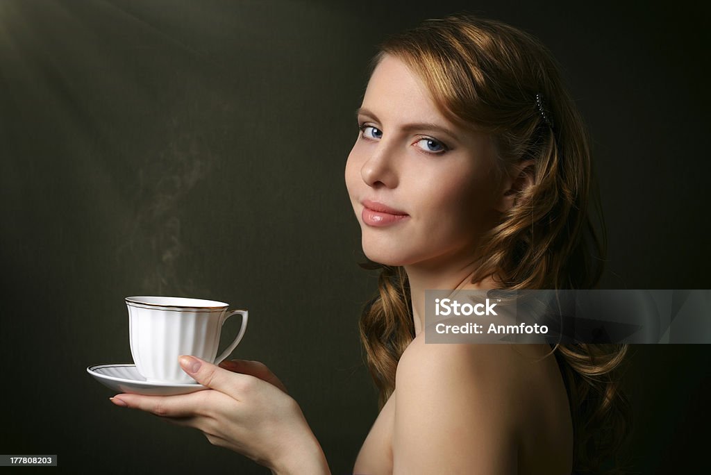 An attractive girl with a cup of coffee Adult Stock Photo