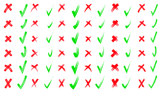 Brush hand drawn doodle checkmarks and crosses set collection. Scribble, pen sketches. Pencil hand drawn checkmarks and little crosses. Yes and no. Red and green shape.