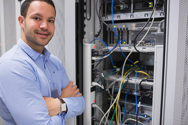 istock Man with crossed arms in front of server 177809334