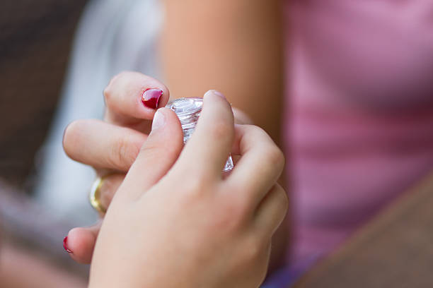 istock Mother gives her daugher parfume 177809530