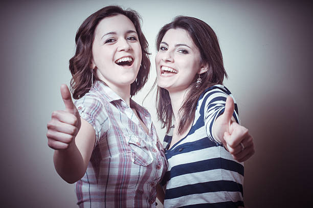 istock two positive young women 177809925