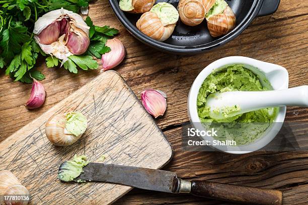 Closeup Of Filling Snails With Garlic Butter Stock Photo - Download Image Now - Agriculture, Animal, Animal Shell