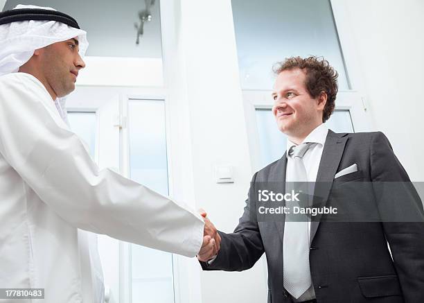 Businesspeople Shaking Hands Stock Photo - Download Image Now - Achievement, Adult, Adults Only