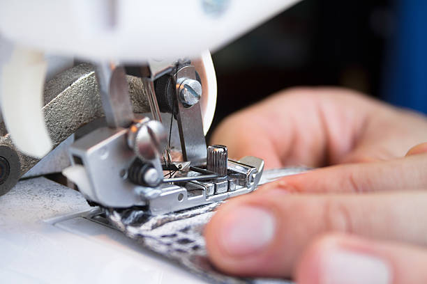 istock Hands of tailor sewing clothes 177811118