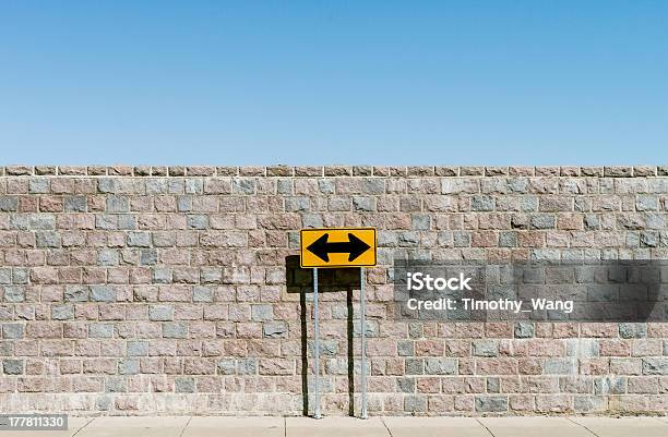 Road Sign With Double Arrows Stock Photo - Download Image Now - Two Objects, Direction, Dead End Sign