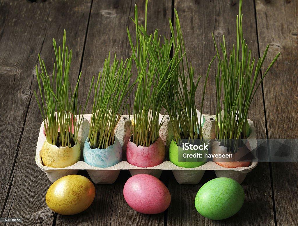 Colored easter eggs Colored easter eggs on wooden table Brown Stock Photo