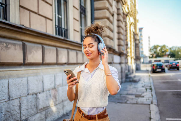 istock Woman using phone in the city 1778124898