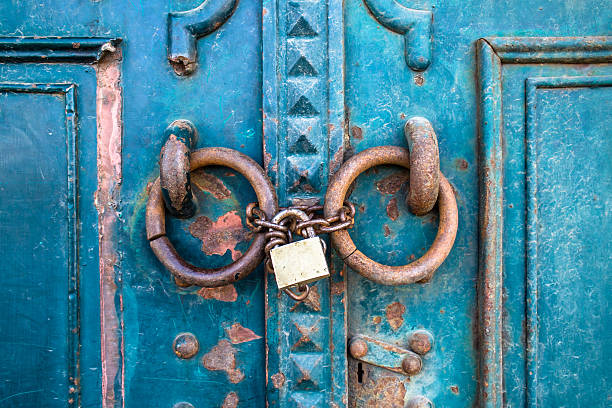 Chained blue door stock photo