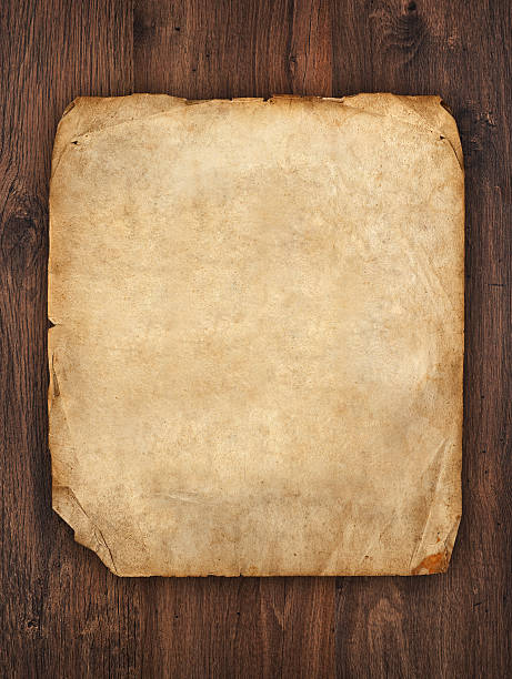 istock old paper on brown wood texture 177813127