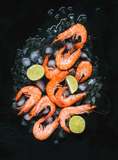 istock Shrimps cooked on dark background copy space. 1778135298