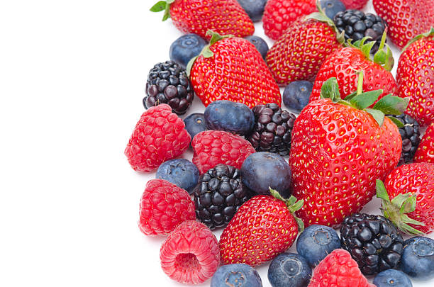 istock Close-up of assorted fresh berries isolated on a white 177815141