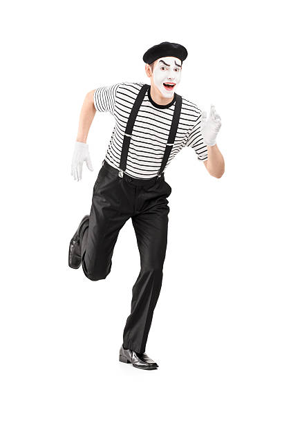 istock Mime artist running and looking at camera 177815981