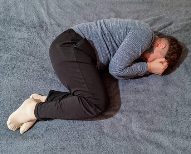 istock Depressed man lying in his bed 1778160035