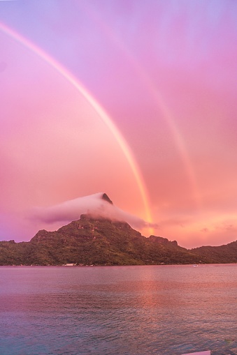 istock Stunning visual of a vibrant multicolored rainbow arching across Bora Bora island 1778172760