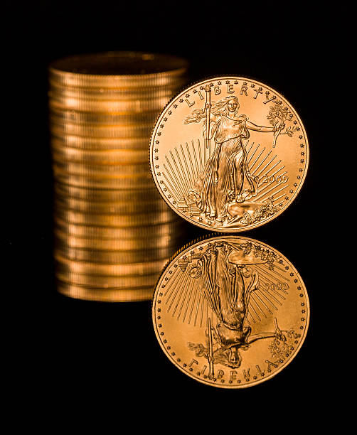 istock Reflection of one ounce gold coin black 177818414