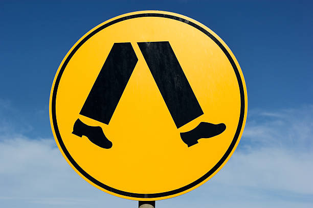 Pedestrians - round yellow sign seen in Australia