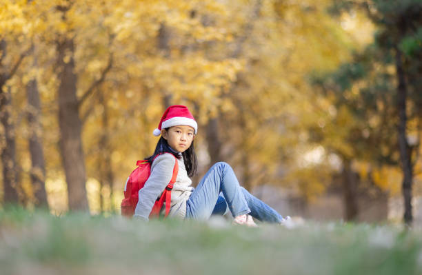 istock Christmas Girl in Autumn 1778197002