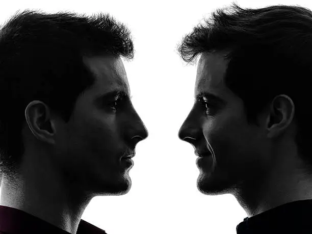 Photo of close up portrait two  men twin brother friends silhouette