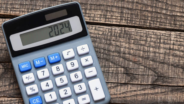 istock 2024 on calculator screen. New year 2024 on the calculator display with copy space 1778211162